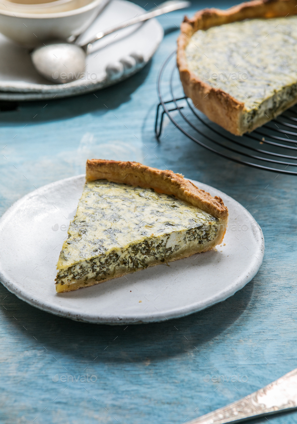 Quiche with spinach traditional dish of french cuisine. Spinach tart Stock Photo by sokorspace