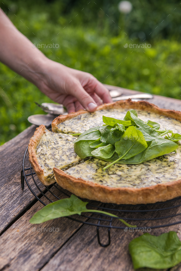 Quiche with spinach traditional dish of french cuisine. Spinach tart