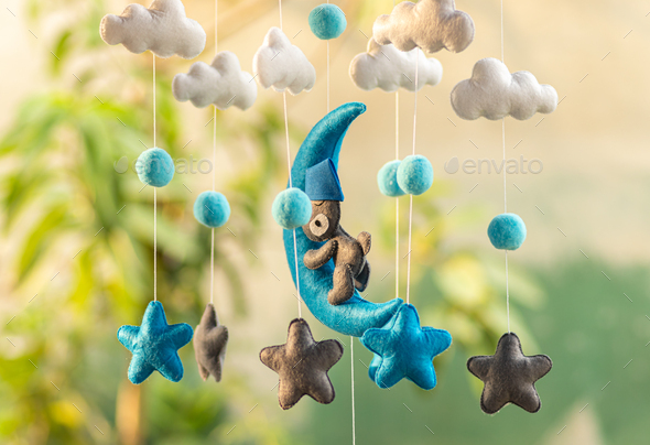 Baby crib hangings, Felt cot mobile made with plush clouds, moon, and stars.