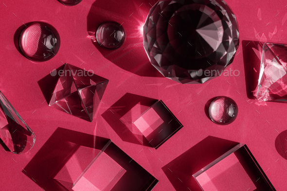 Color of the year 2023 Viva magenta. Crystal prism refracting light, magic crystals and pyramid