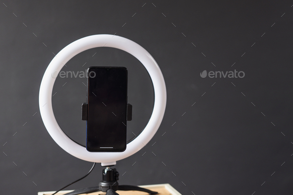 Smartphone on ringlight for vlogger - Stock Photo - Images