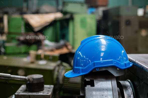 Blue helmet or hard hat for head safety in industry factory. equipment safe of worker construction.