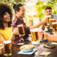 Multicultural people drinking and toasting beer pint at brewery bar restaurant - PhotoDune Item for Sale