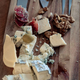 cheese plate with different types, with walnuts and tasting devices, top view - PhotoDune Item for Sale