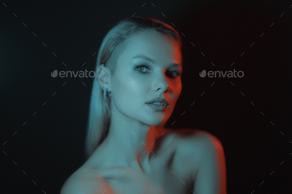 Creative lights play on female body. - Stock Photo - Images