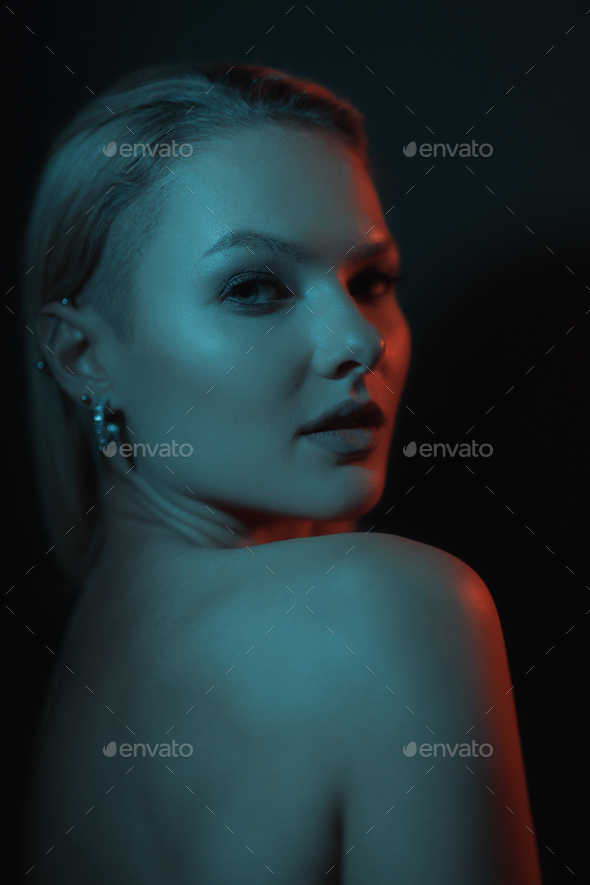 Creative lights play on female body. - Stock Photo - Images
