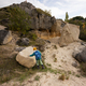 Boy explore limestone stones at mountain in Pidkamin, Ukraine. - PhotoDune Item for Sale