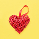 Red wicker heart on yellow background. Copy space, top view. Valentines Day concept - PhotoDune Item for Sale