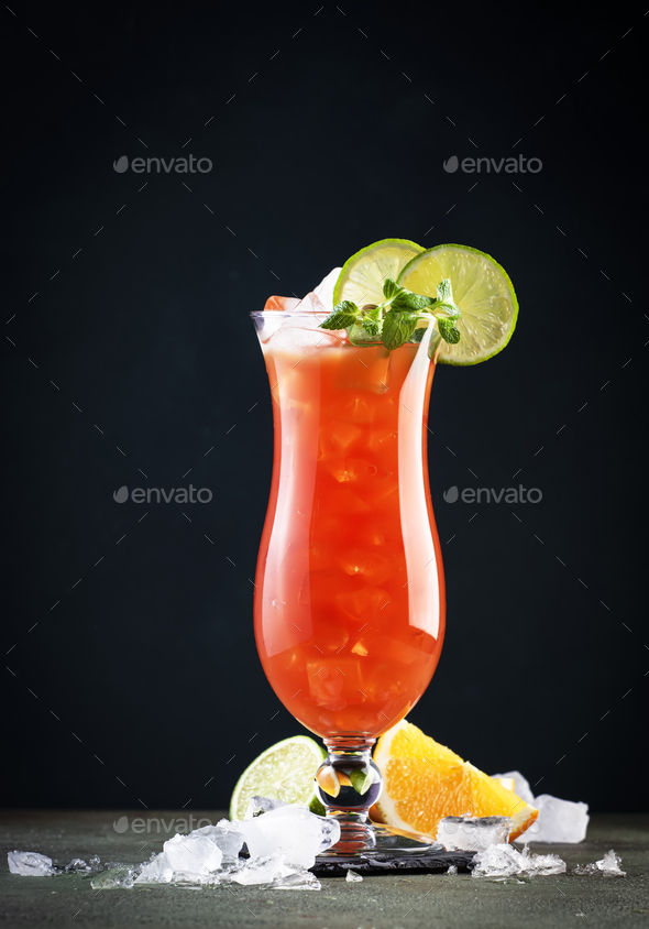 Hurricane, classic alcoholic cocktail with dark and white rum, ice, syrup, grenadine, pineapple