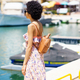 Black woman admiring sea in port - PhotoDune Item for Sale