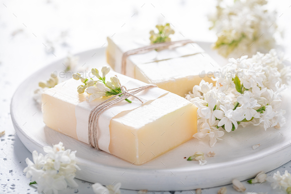 Aromatic lilac soap made of flowers. Flower aromatic soap. Stock Photo by  Shaiith