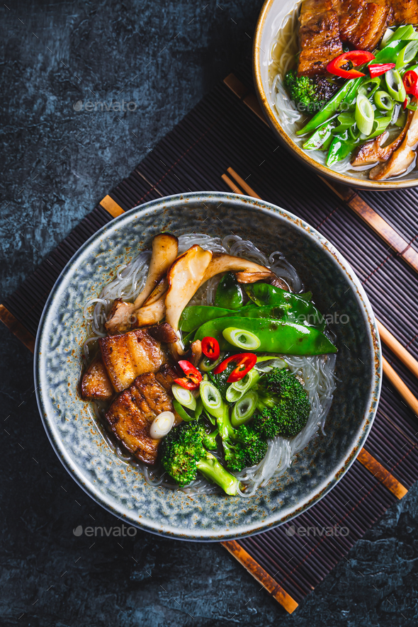 Ramen soup  with mushrooms, vegetables, glass noodles and  pork - Stock Photo - Images