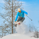 Skier jumps into the deep snow - PhotoDune Item for Sale