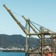 Harbor crane for unloading at port - PhotoDune Item for Sale