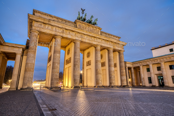 The famous Brandenburg Gate at dawn - Stock Photo - Images