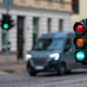traffic light on the street junction with beautiful bokeh, city with cars in the background - PhotoDune Item for Sale