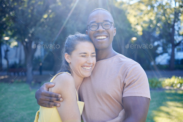 Happy Interracial Couple Hug And Laughing In Joy For Bonding Relationship Together In The Park 2475