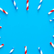 Drinking straws for party on blue background with copy space. - PhotoDune Item for Sale