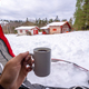 Having a coffee in a cup inside a tent on a winter morning, winter free camping - PhotoDune Item for Sale