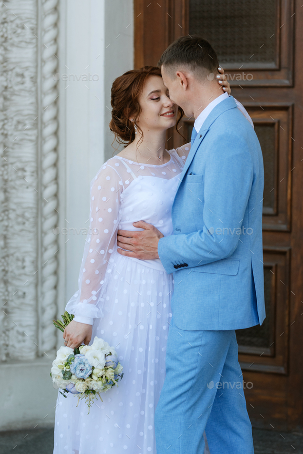 Wedding Dress and Wedding Suit for the Bride and Groom Stock