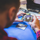 IT engineer technician repairing computer in electronics service shop - PhotoDune Item for Sale