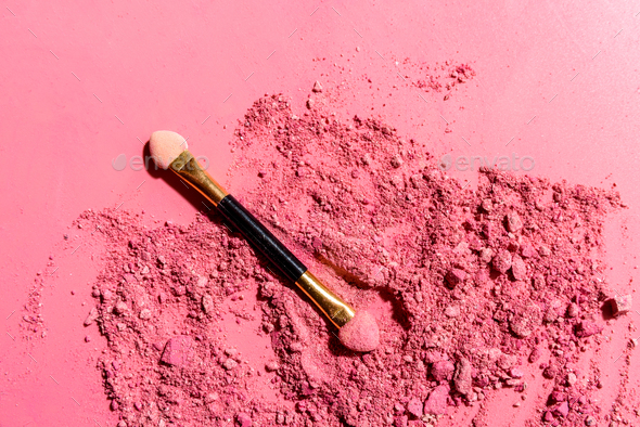Crushed pink eye shadows with applicator blending brush - Stock Photo - Images