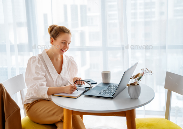 woman working on a laptop - Stock Photo - Images