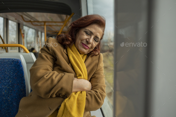 senior woman sleeping train - woman traveling on the train - Stock Photo - Images
