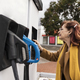 mature woman charging electric car - PhotoDune Item for Sale