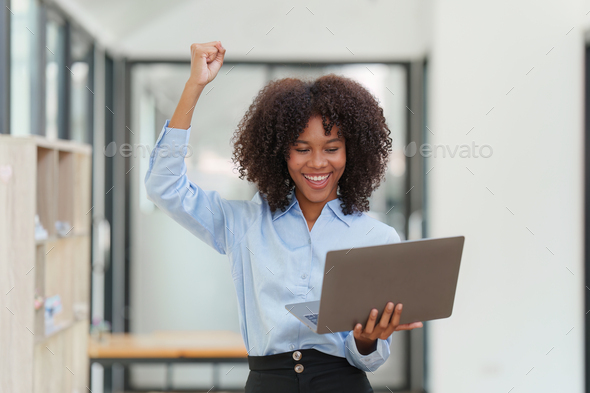 Financial advisor, corporate accountant and african woman in office. analyzing benefits, enjoying - Stock Photo - Images
