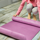 Child, little girl rolling up yoga pilates mat on floor after stretching exercises - PhotoDune Item for Sale