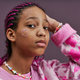 Black teenage girl with sparkling tattoos on face - PhotoDune Item for Sale