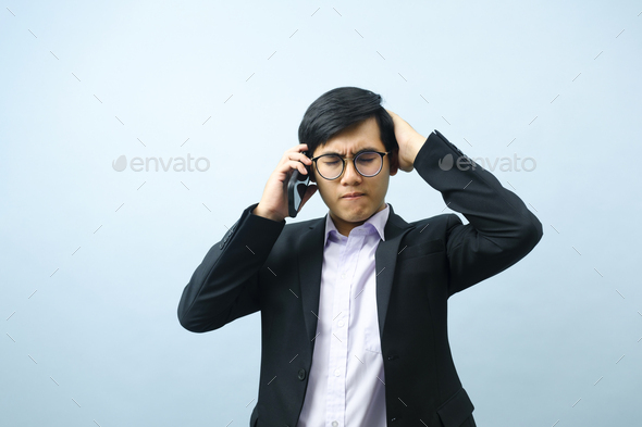 Portrait of businessman talking on phone. - Stock Photo - Images