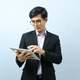 Portrait of businessman using tablet. - PhotoDune Item for Sale