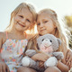 Children, smile and teddy outdoor portrait with happiness, smile and bonding together. Freedom, hap - PhotoDune Item for Sale