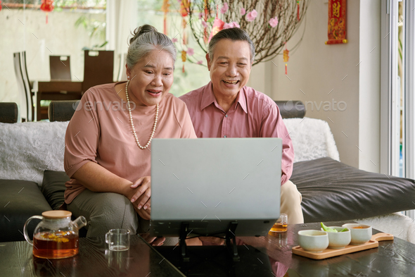 Aged Couple Making Video Call - Stock Photo - Images