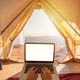 Young woman freelancer working online using laptop and enjoying the beautiful nature landscape - PhotoDune Item for Sale