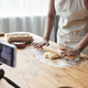 Black woman baking homemade pastry recording video or livestream - PhotoDune Item for Sale