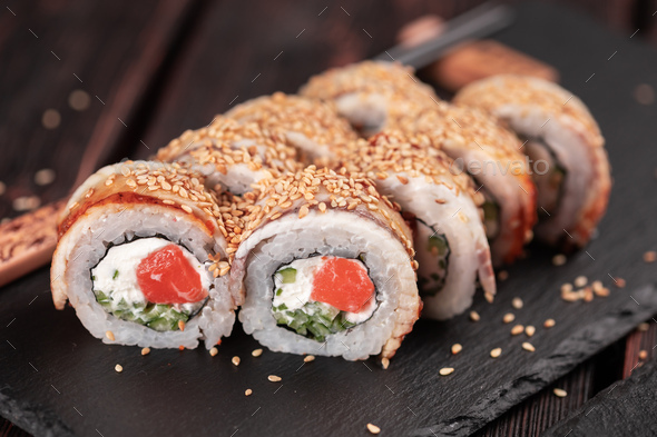 Gunkan Maki Sushi of fish salmon, scallop, perch, eel, shrimp and