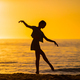 Happy teen girl enjoy tropical beach vacation at sunset - PhotoDune Item for Sale