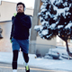 Below view of sportsman jogging on the street on winter day. - PhotoDune Item for Sale