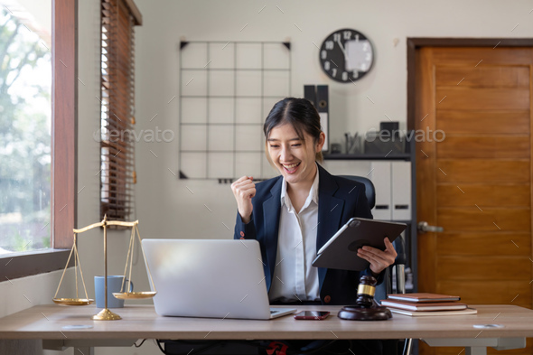 Asian business lawyer are excited about celebrating business success with inspiration from their - Stock Photo - Images