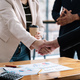 Business people shaking hands, finishing up meeting, business etiquette, congratulation, merger and - PhotoDune Item for Sale