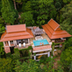 couple men and woman on a luxury vacation at a pool villa in the jungle rainforest - PhotoDune Item for Sale