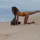 Woman seen exercising at the beach - PhotoDune Item for Sale