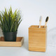 two toothbrushes in bamboo folder. white towel and artificial flower on white background - PhotoDune Item for Sale