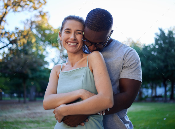 Happy Interracial Couple Hug And Smile For Love Care Or Bonding