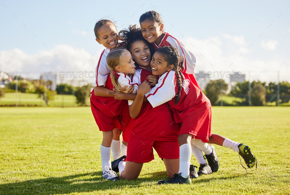 Soccer children team, winner or happy for success, goal or wellness in match, game or fitness with