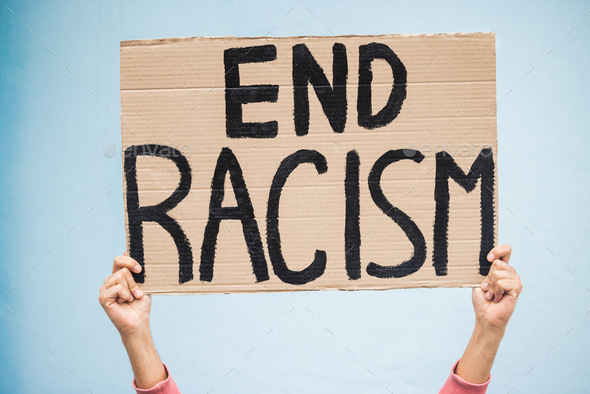 Hands, cardboard poster and end racism for protest, march or community ...