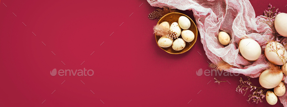 Easter background with eggs and napkin on dark red backround. - Stock Photo - Images